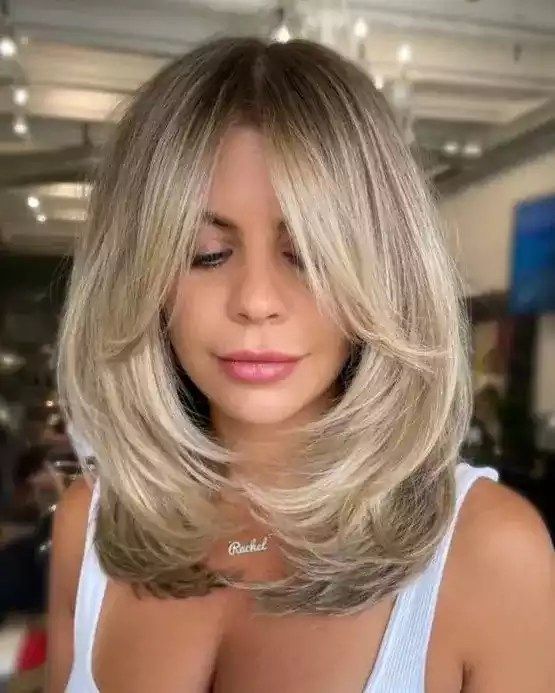 53 Chic Medium-Length Layered Haircuts: Shoulder-Length Styles & Face-Framing Layers 9 Medium-Length Layered Haircuts