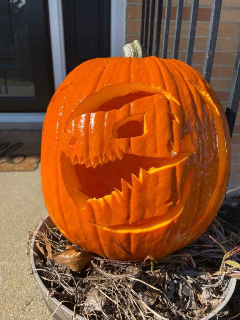 61 Creative Dinosaur Pumpkin Carving Ideas: Easy Stencils, Templates & Designs for Kids 18 Dinosaur Pumpkin Carving